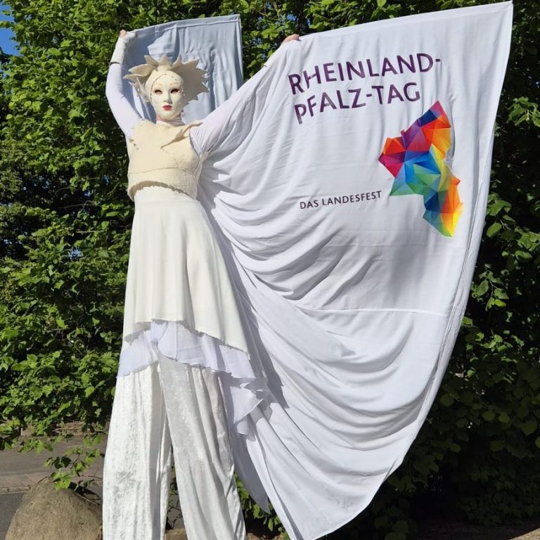 Werbung Marketing Stelzenläufer Performance RLP-Tag